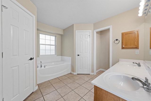 full bathroom with a garden tub, tile patterned floors, a sink, and double vanity