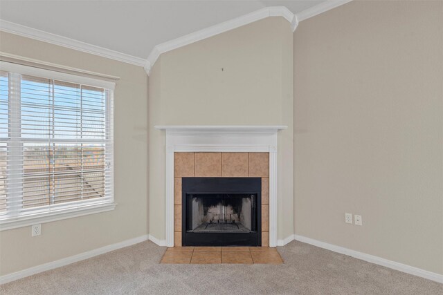 room details featuring a tile fireplace, baseboards, carpet floors, and ornamental molding