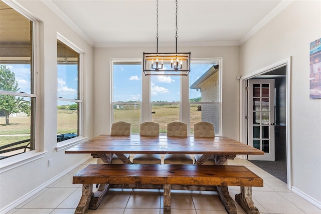 125 Sams Ln, Aledo, TX 76008 - dining room featuring ornamental molding, baseboards, a chandelier, and light tile patterned floors