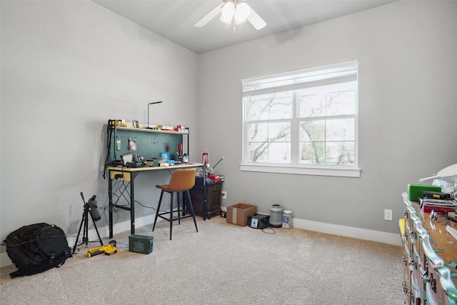 office space with carpet and ceiling fan
