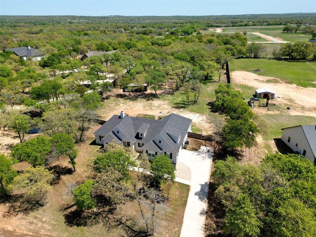 birds eye view of property featuring a rural view