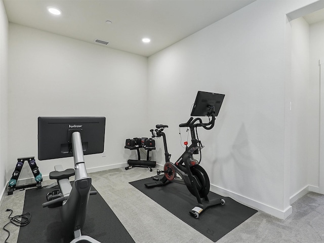 exercise area featuring visible vents, baseboards, carpet, and recessed lighting