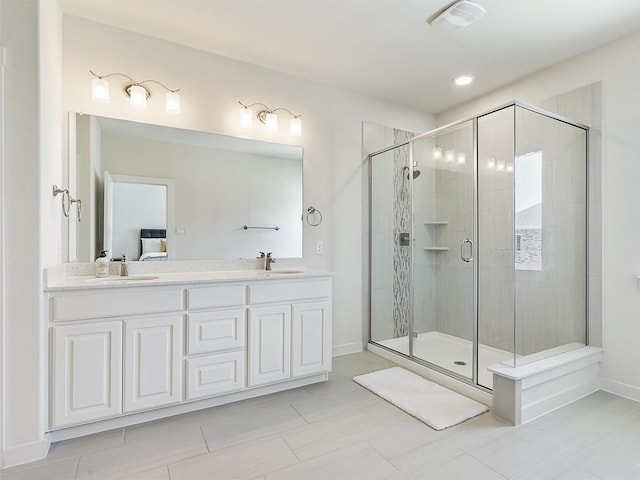 bathroom with visible vents, a shower stall, connected bathroom, and a sink
