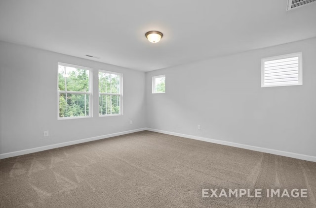 1717 Zachary Ave, Wylie, TX 75098 - empty room featuring carpet, visible vents, and baseboards