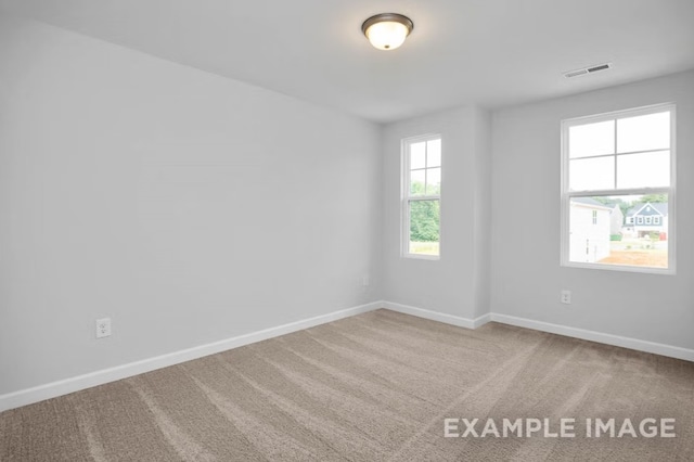 1717 Zachary Ave, Wylie, TX 75098 - carpeted spare room with visible vents and baseboards
