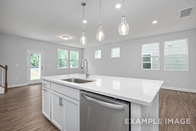 1717 Zachary Ave, Wylie, TX 75098 - kitchen featuring a sink, visible vents, dishwasher, light countertops, and dark wood-type flooring