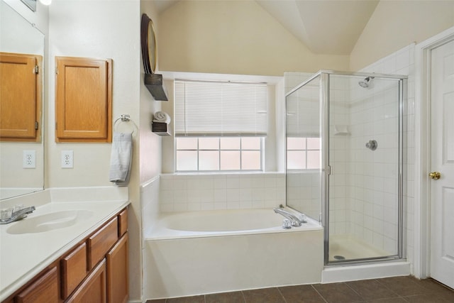 bathroom with tile patterned floors, a garden tub, vanity, and a shower stall