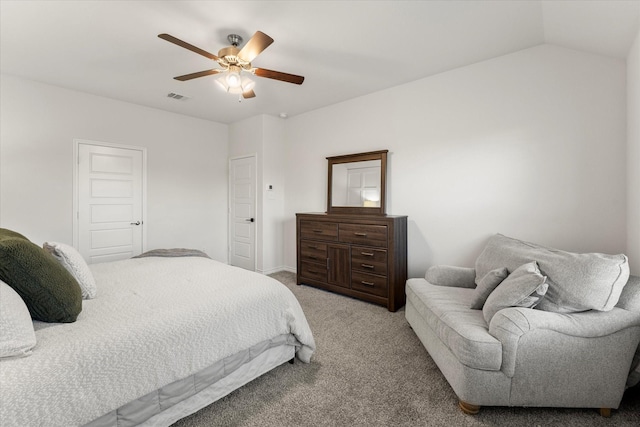 bedroom with carpet, visible vents, and ceiling fan