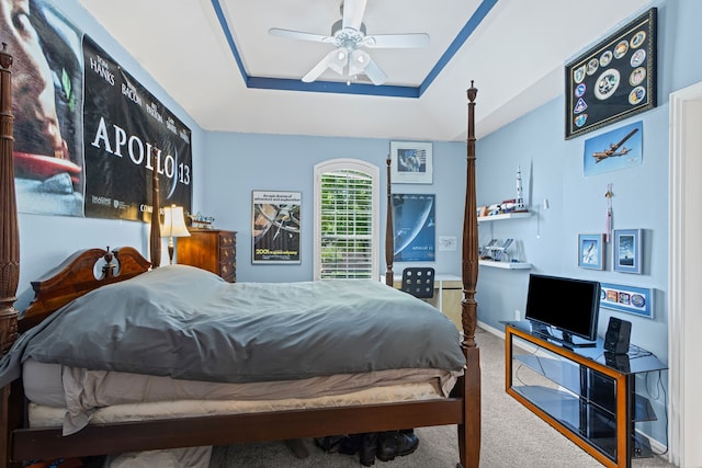 720 Castle Creek Dr, Coppell, TX 75019 - bedroom featuring a raised ceiling, carpet floors, and ceiling fan
