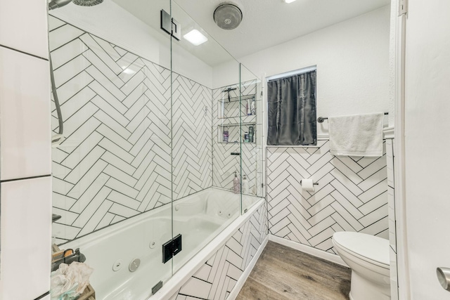 106 Guinevere Ct, Weatherford, TX 76086 - full bathroom featuring a combined bath / shower with jetted tub, toilet, and wood finished floors
