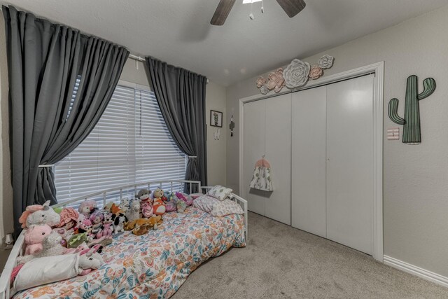 106 Guinevere Ct, Weatherford, TX 76086 - bedroom featuring ceiling fan, baseboards, carpet, and a closet