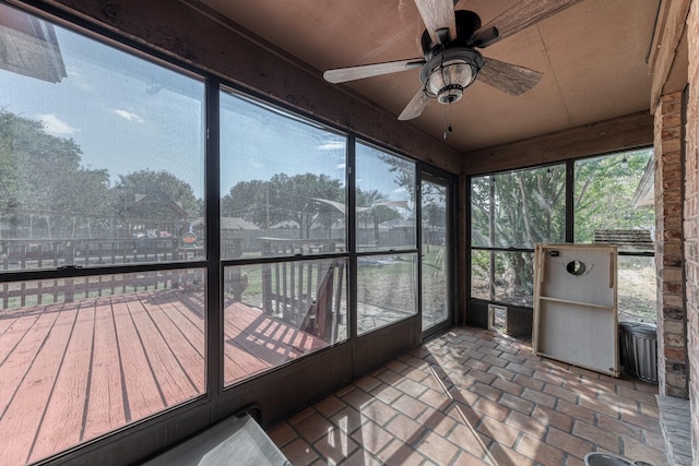 106 Guinevere Ct, Weatherford, TX 76086 - unfurnished sunroom with a ceiling fan