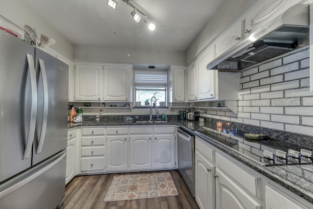 106 Guinevere Ct, Weatherford, TX 76086 - kitchen featuring wall chimney range hood, dark wood-style flooring, appliances with stainless steel finishes, a sink, and white cabinets