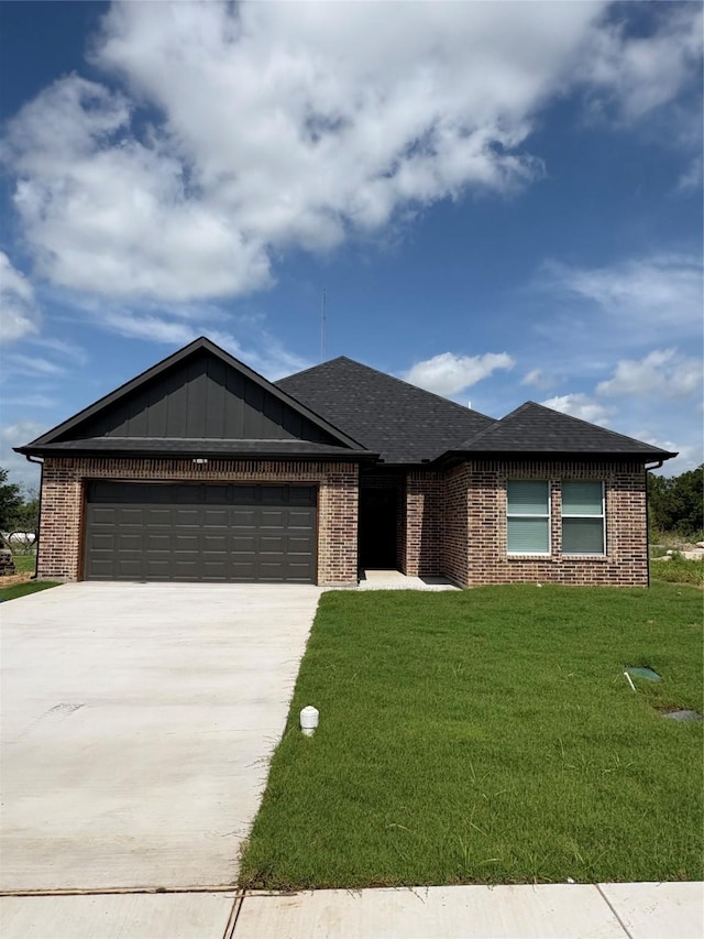 711 N College St, West, TX 76691 - ranch-style house with brick siding, an attached garage, a front lawn, and concrete driveway