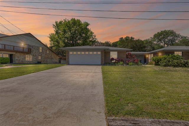 5008 Santa Elena Ct, Granbury, TX 76049 - view of front of property featuring a garage, driveway, and a front lawn