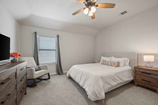 bedroom featuring lofted ceiling, light carpet, a ceiling fan, and visible vents