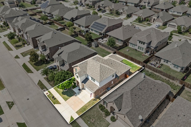 drone / aerial view with a residential view