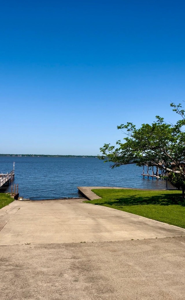 property view of water featuring a dock