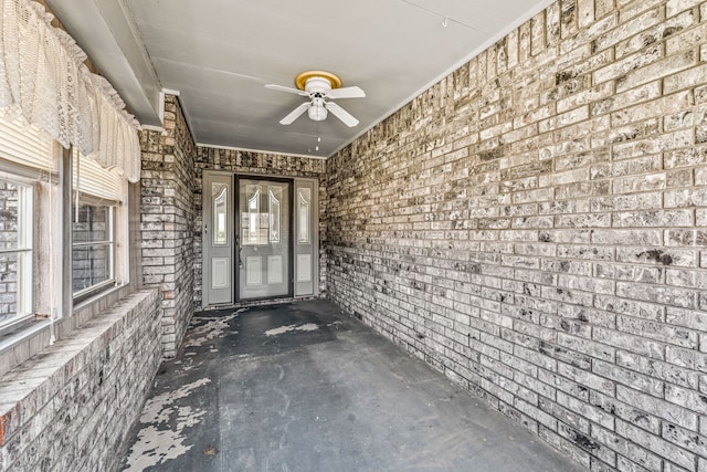 exterior space featuring a ceiling fan