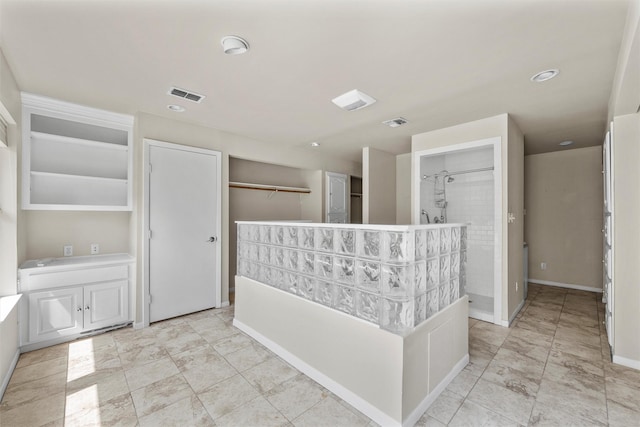 interior space featuring visible vents and baseboards
