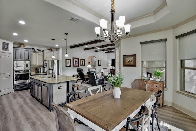 1601 Harbor Lakes Dr, Granbury, TX 76048 - dining space with ornamental molding, ceiling fan, light wood-style flooring, recessed lighting, and a chandelier