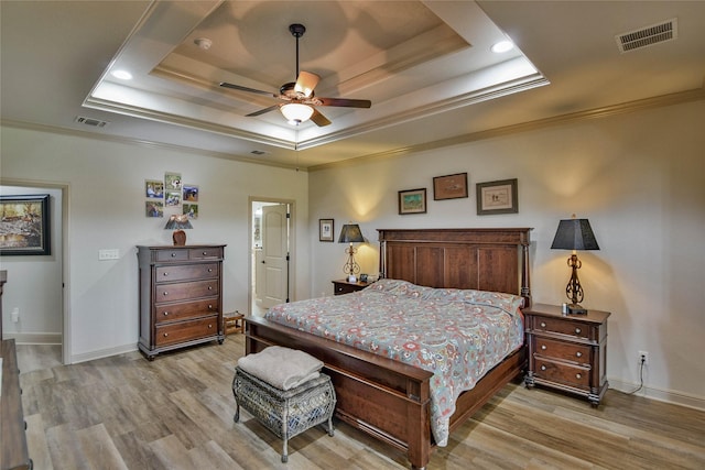 1601 Harbor Lakes Dr, Granbury, TX 76048 - bedroom with a raised ceiling, light wood-type flooring, ornamental molding, baseboards, and a ceiling fan
