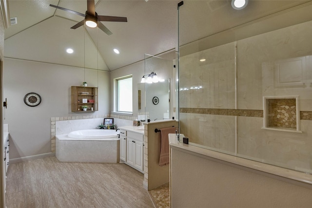 1601 Harbor Lakes Dr, Granbury, TX 76048 - bathroom with a ceiling fan, a garden tub, vanity, lofted ceiling, and a walk in shower