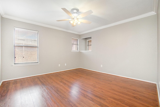 24 Cedar Ln, Bedford, TX 76021 - empty room featuring crown molding, ceiling fan, wood finished floors, and baseboards