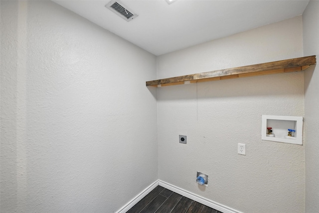 8104 Lea Shore St, Fort Worth, TX 76179 - clothes washing area featuring laundry area, visible vents, dark wood finished floors, baseboards, and hookup for a washing machine