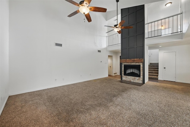 8104 Lea Shore St, Fort Worth, TX 76179 - unfurnished living room featuring carpet flooring, a high ceiling, a ceiling fan, baseboards, and visible vents