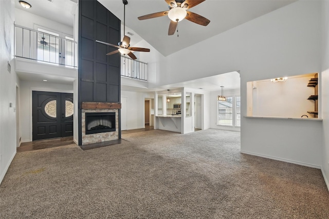 8104 Lea Shore St, Fort Worth, TX 76179 - unfurnished living room featuring a ceiling fan, carpet, high vaulted ceiling, and a tile fireplace