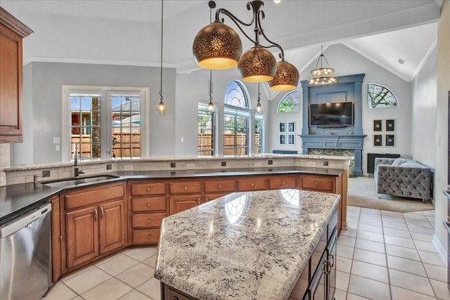 kitchen with dishwasher, lofted ceiling, brown cabinetry, and a sink