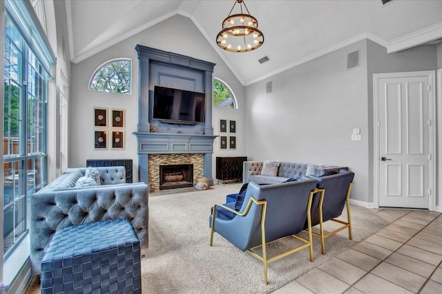 living room featuring high vaulted ceiling, a fireplace with flush hearth, a chandelier, and visible vents
