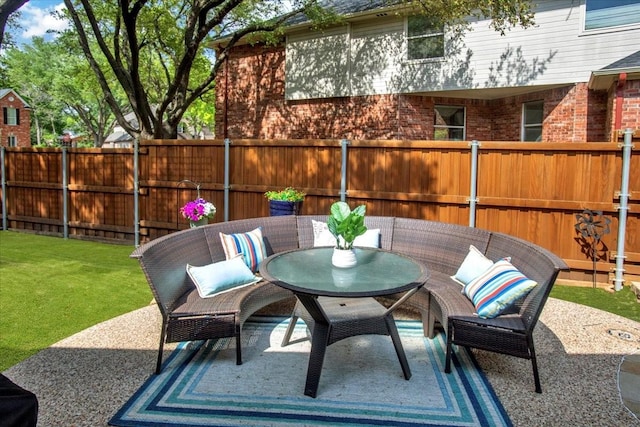 view of patio with fence and outdoor dining space