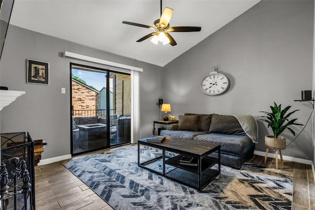 5335 Bent Tree Forest Dr Unit 267, Dallas, TX 75248 - living room with vaulted ceiling, ceiling fan, baseboards, and wood finished floors
