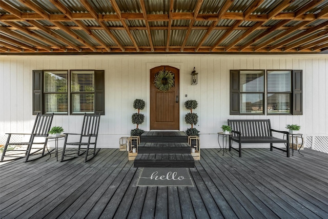 doorway to property featuring a porch