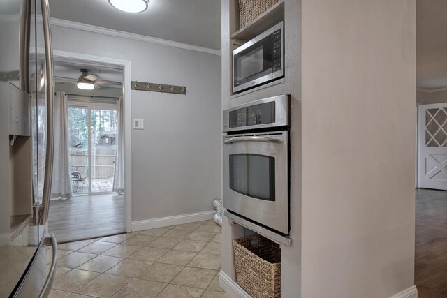 1208 Lake Cross Rd, Hideaway, TX 75771 - kitchen with stainless steel appliances, baseboards, ornamental molding, ceiling fan, and light tile patterned floors