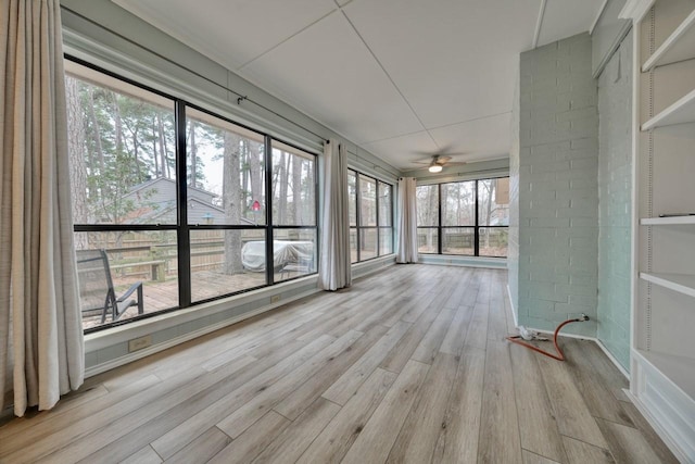 1208 Lake Cross Rd, Hideaway, TX 75771 - unfurnished sunroom featuring wood finished floors