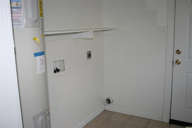 1916 Grainger St, Fort Worth, TX 76110 - washroom featuring washer hookup, water heater, electric dryer hookup, light tile patterned floors, and baseboards