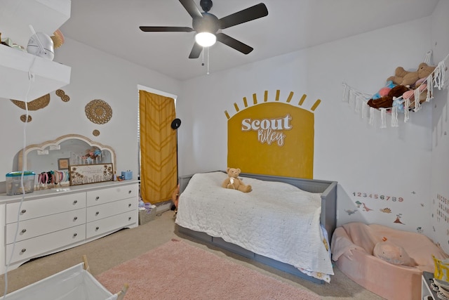 carpeted bedroom with a ceiling fan