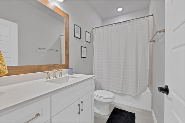 bathroom with vanity, tile patterned flooring, shower / bathtub combination with curtain, and toilet