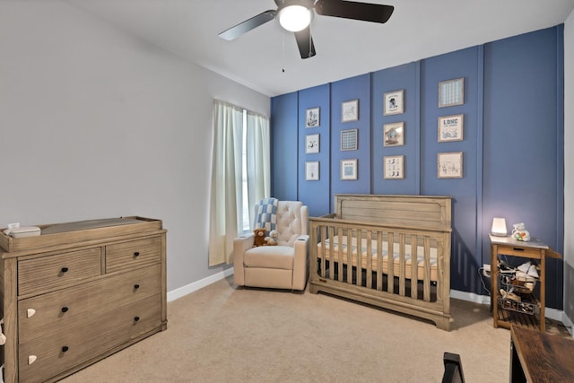 1373 Silverthorn Trl, Justin, TX 76247 - bedroom featuring carpet flooring, a nursery area, baseboards, and a ceiling fan