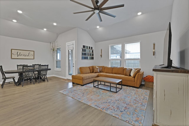 1373 Silverthorn Trl, Justin, TX 76247 - living area with lofted ceiling, a ceiling fan, healthy amount of natural light, light wood-style floors, and recessed lighting