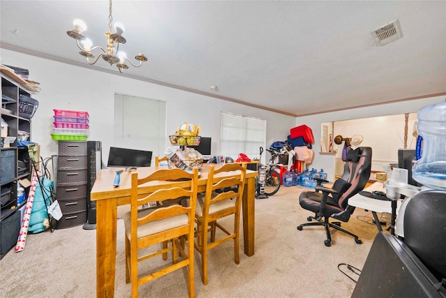 carpeted office featuring visible vents, ornamental molding, and a notable chandelier