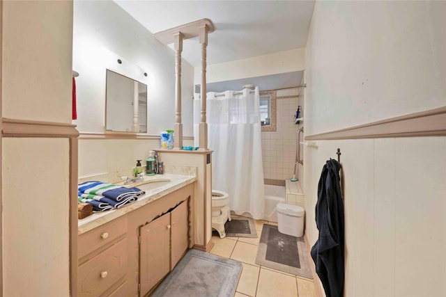 full bath featuring shower / tub combo, vanity, toilet, and tile patterned flooring