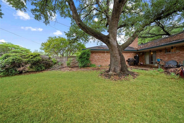 view of yard with fence