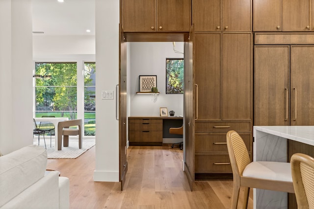office featuring light wood-type flooring and recessed lighting