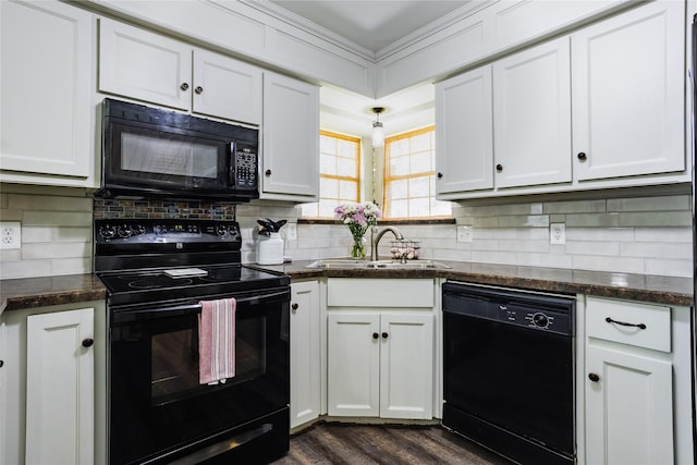 511 Kamber Ln, Wylie, TX 75098 - kitchen featuring black appliances, a sink, white cabinets, decorative backsplash, and ornamental molding