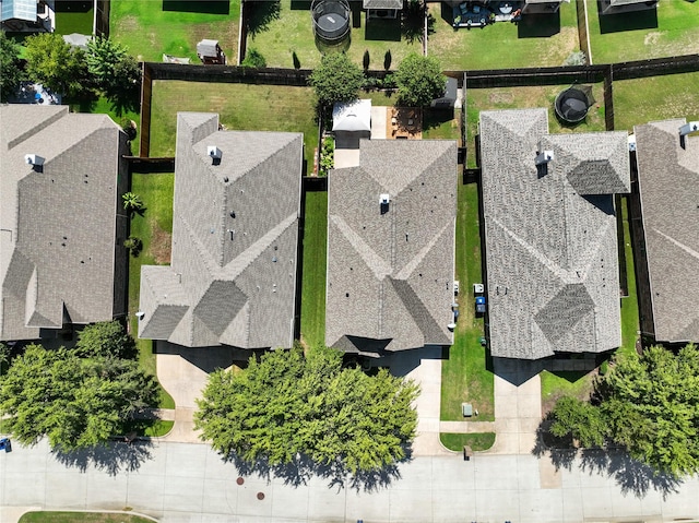 birds eye view of property with a residential view