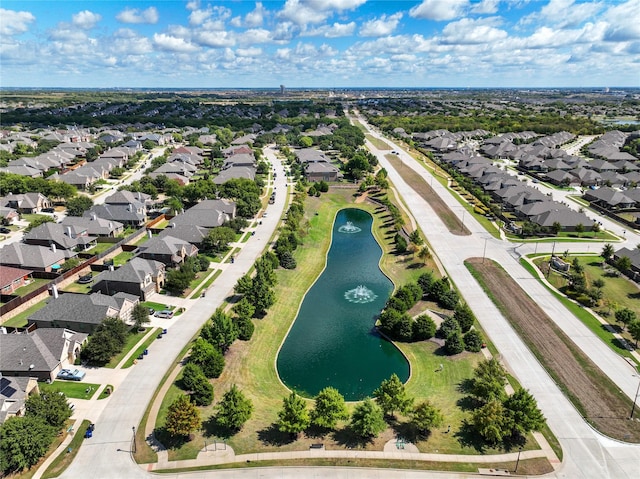 aerial view with a residential view and a water view